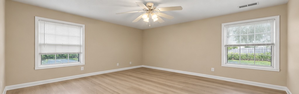 5 Richardson bedroom with beige walls and light wood LVP flooring