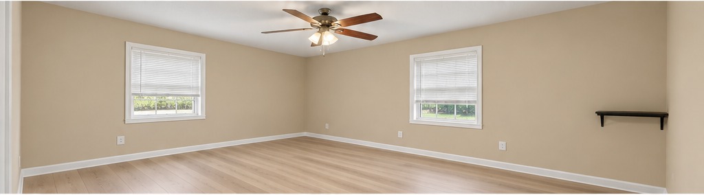 5 Richardson bedroom with beige walls and light wood LVP flooring